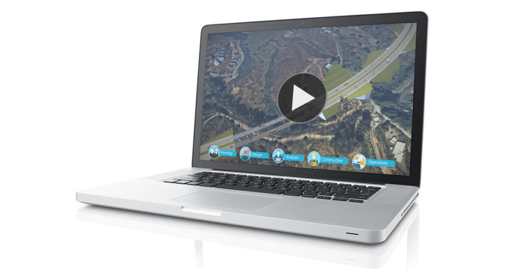 Laptop displaying a demo video player with a play button overlay on a satellite image of a highway, using OpenBridge Designer, with various multimedia icons around the screen.