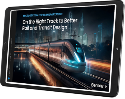 A tablet displaying an advertisement for Bentley's MicroStation software showcases a futuristic train zooming through a cityscape, highlighting cutting-edge infrastructure design for better infrastructure solutions.